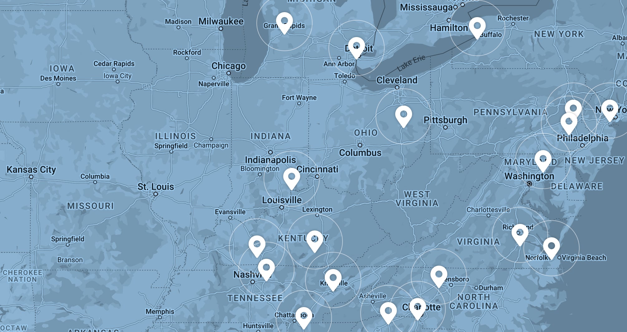 A map of North America overlaid in blue with white location markers.